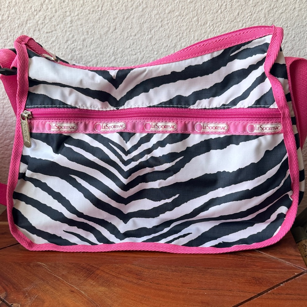 Lesportsac Black & White Zebra Print Crossbody with Pink Trim